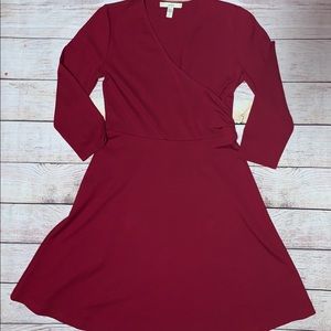 Three quarter sleeve faux wrap dress